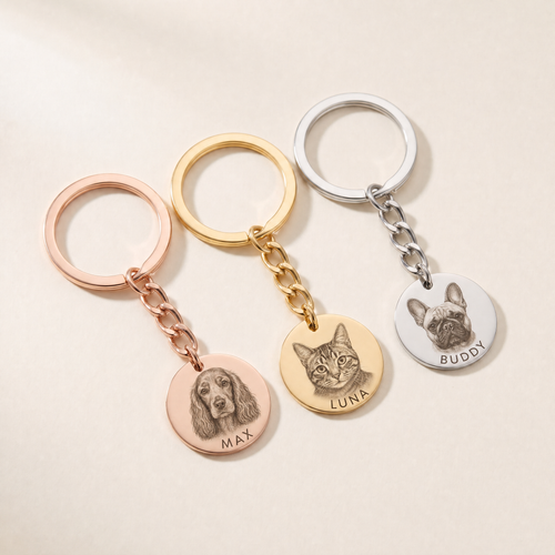 Pet portrait keyring in all three finishes: rose gold, gold and silver steel, each engraved with a pet's photo