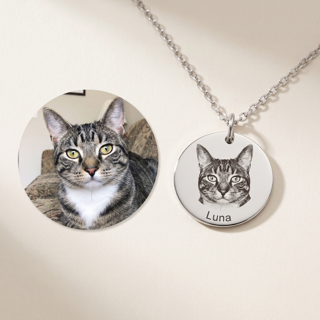 The customer's photo of their tabby cat beside the same cat laser-engraved on a silver pendant